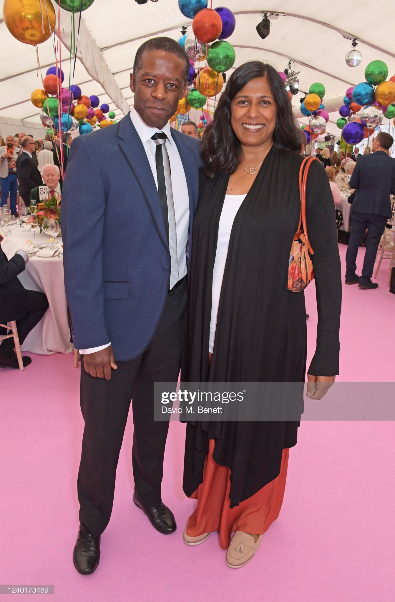 STRATFORD-UPON-AVON, ENGLAND - APRIL 23:  Adrian Lester and Playwright Lolita Chakrabarti attend Shakespeare's Birthday lunch presented by Pragnell and hosted by Alexander Armstrong in the grounds of the Royal Shakespeare Company on April 23, 2022 in Stratford-upon-Avon, England. (Photo by David M. Benett/Dave Benett/Getty Images for George Pragnell LTD)
